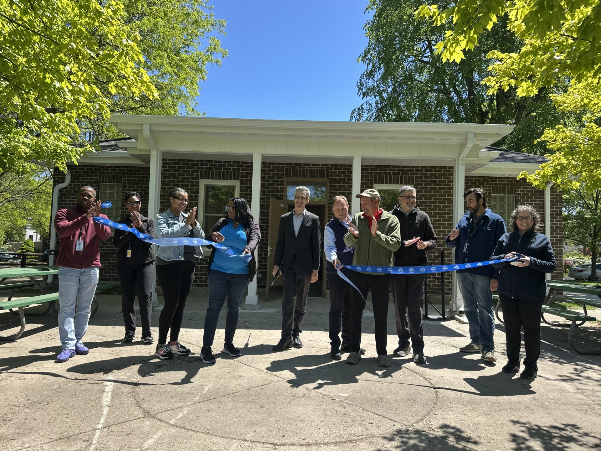 people cutting the ribbon for Independence Park